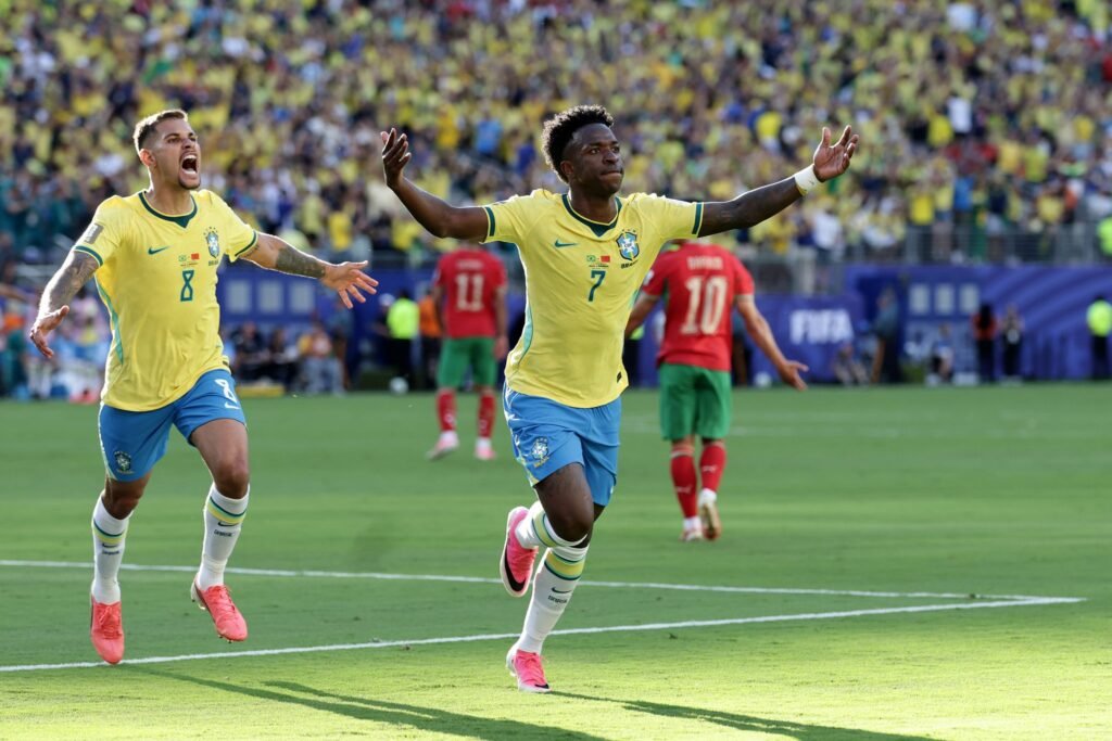 Brasil vence a Escocia, garante lideranca do grupo e avanca ao mata-mata da Copa