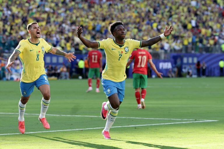 Brasil vence a Escocia, garante lideranca do grupo e avanca ao mata-mata da Copa